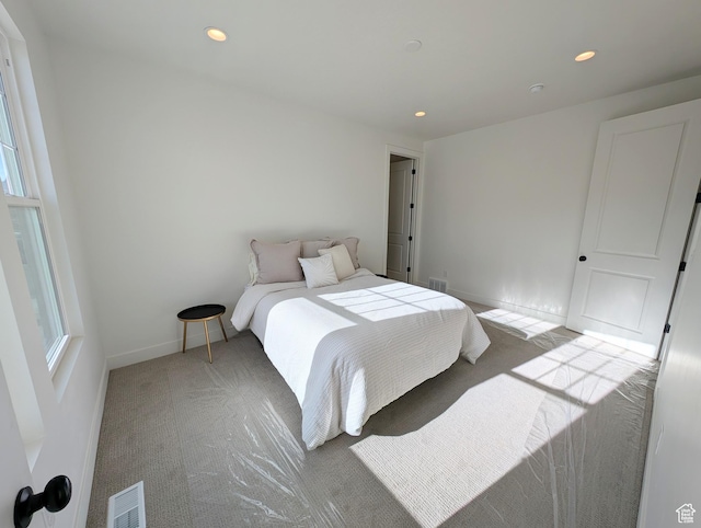 11369 S Watercourse Rd W Unit 202, South Jordan, UT 84009 - carpeted bedroom with recessed lighting and baseboards