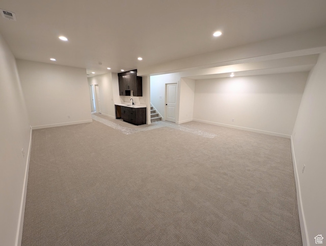 11369 S Watercourse Rd W Unit 202, South Jordan, UT 84009 - finished basement featuring recessed lighting, light colored carpet, and stairway