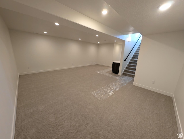 11369 S Watercourse Rd W Unit 202, South Jordan, UT 84009 - finished basement featuring light carpet, recessed lighting, and stairway