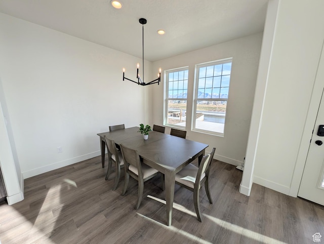11369 S Watercourse Rd W Unit 202, South Jordan, UT 84009 - dining space featuring a chandelier, wood finished floors, and recessed lighting