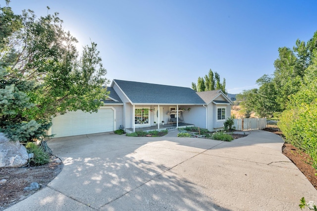 2313 N 850 E, Lehi, UT 84043 - ranch-style house featuring driveway, a porch, a garage, and stucco siding