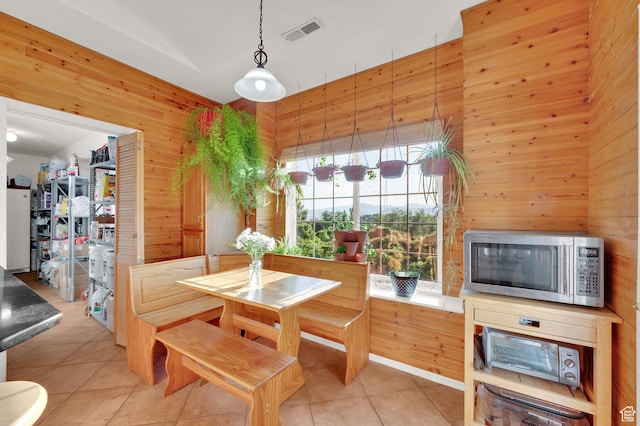 2313 N 850 E, Lehi, UT 84043 - dining area featuring wood walls and light tile patterned flooring