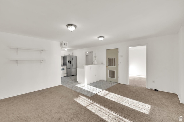 2313 N 850 E, Lehi, UT 84043 - unfurnished living room with light colored carpet and baseboards