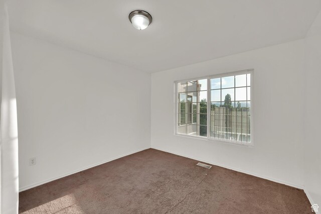 2313 N 850 E, Lehi, UT 84043 - unfurnished room featuring dark carpet and baseboards