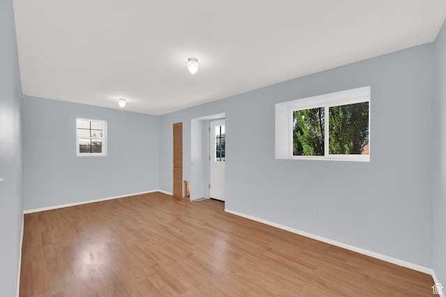 2313 N 850 E, Lehi, UT 84043 - unfurnished room with plenty of natural light and light wood-style flooring