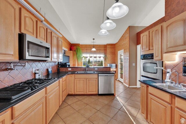2313 N 850 E, Lehi, UT 84043 - kitchen with stainless steel appliances, a peninsula, backsplash, light brown cabinets, and light tile patterned floors