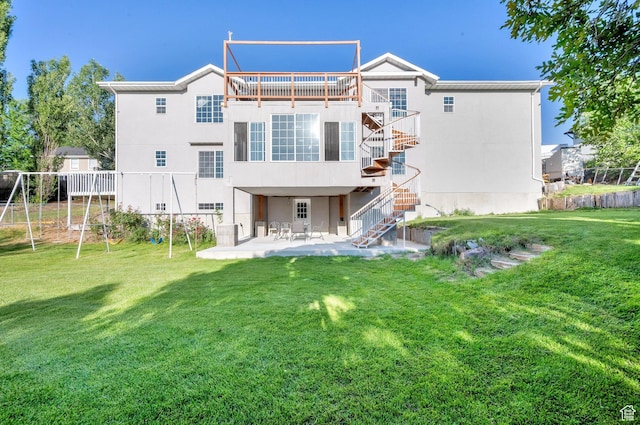 2313 N 850 E, Lehi, UT 84043 - back of house with stairs, a patio, a deck, and stucco siding