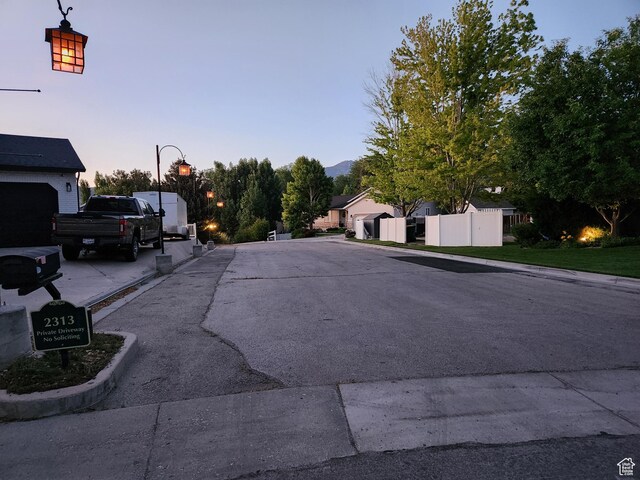2313 N 850 E, Lehi, UT 84043 - view of asphalt road featuring street lighting and curbs