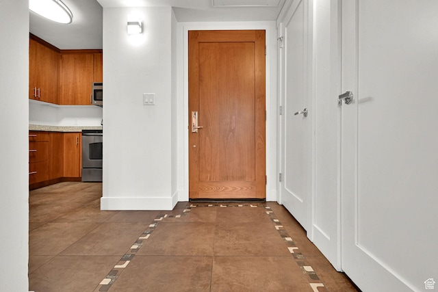 230 E Broadway S Unit 1108, Salt Lake City, UT 84111 - hallway with baseboards and inlaid floor details
