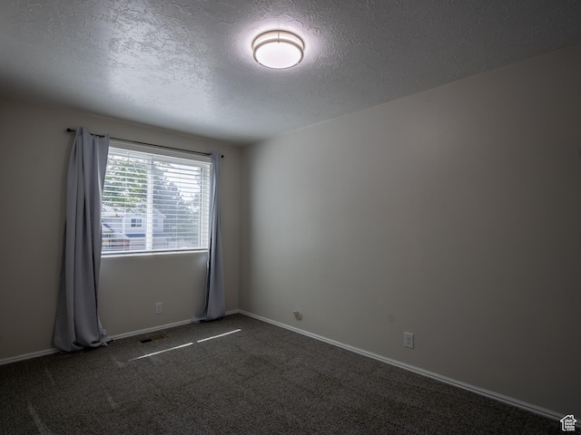8823 S 3715 W, West Jordan, UT 84088 - empty room featuring a textured ceiling and dark carpet