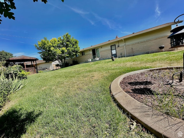 1208 Valhalla Dr, Clearfield, UT 84015 - view of grassy yard featuring a gazebo