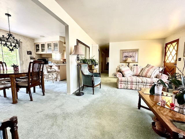 1208 Valhalla Dr, Clearfield, UT 84015 - living area featuring a chandelier and light carpet