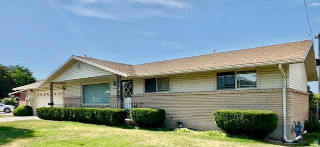 1208 Valhalla Dr, Clearfield, UT 84015 - ranch-style home with a garage and a front yard