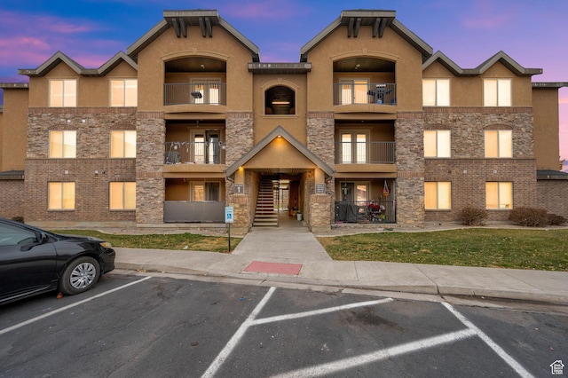 1045 S 1700 W Unit 133, Payson, UT 84651 - property at dusk featuring uncovered parking