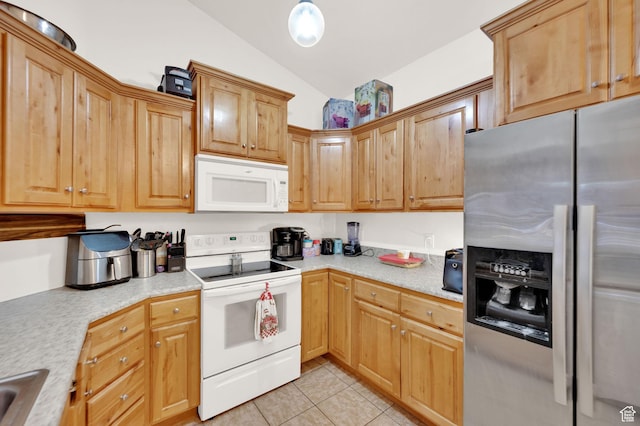 1045 S 1700 W Unit 133, Payson, UT 84651 - kitchen featuring white appliances, vaulted ceiling, light tile patterned flooring, and light countertops