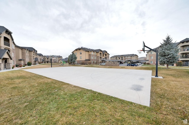 1045 S 1700 W Unit 133, Payson, UT 84651 - view of sport court featuring a residential view, a yard, and community basketball court