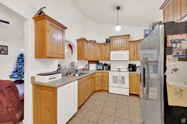 1045 S 1700 W Unit 133, Payson, UT 84651 - kitchen featuring white appliances, lofted ceiling, light countertops, light tile patterned floors, and pendant lighting