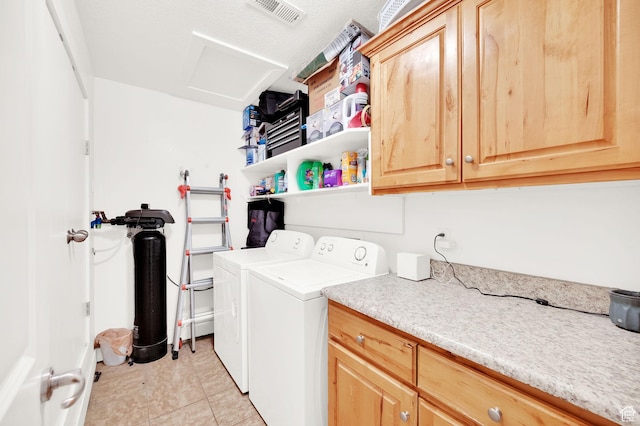 1045 S 1700 W Unit 133, Payson, UT 84651 - laundry area with washer and clothes dryer, cabinet space, attic access, and light tile patterned floors