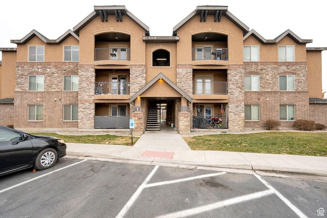 1045 S 1700 W Unit 133, Payson, UT 84651 - view of building exterior with uncovered parking