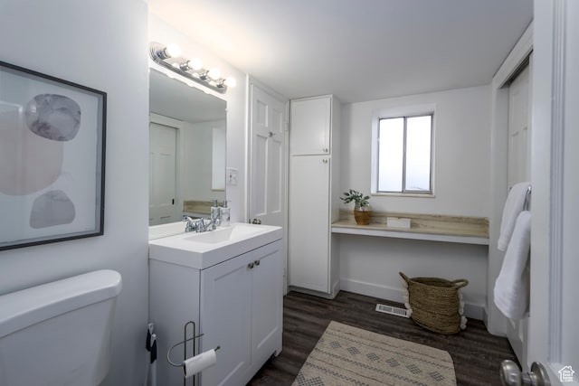 2220 E Murray Holladay Rd S Unit 75, Salt Lake City, UT 84117 - bathroom featuring vanity and wood finished floors