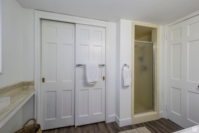 2220 E Murray Holladay Rd S Unit 75, Salt Lake City, UT 84117 - full bath featuring a stall shower and wood finished floors