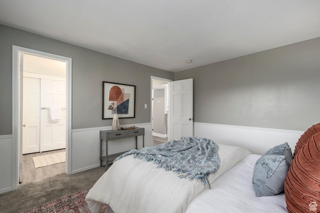 2220 E Murray Holladay Rd S Unit 75, Salt Lake City, UT 84117 - bedroom featuring carpet and baseboards