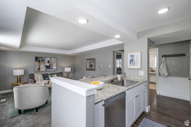2220 E Murray Holladay Rd S Unit 75, Salt Lake City, UT 84117 - kitchen with stainless steel dishwasher, open floor plan, white cabinets, recessed lighting, and a peninsula