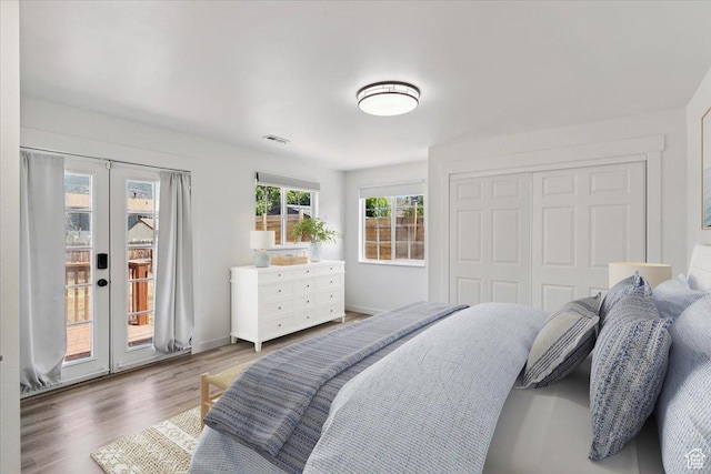 321 E 1040 N, Orem, UT 84057 - bedroom featuring access to exterior, french doors, wood finished floors, and a closet