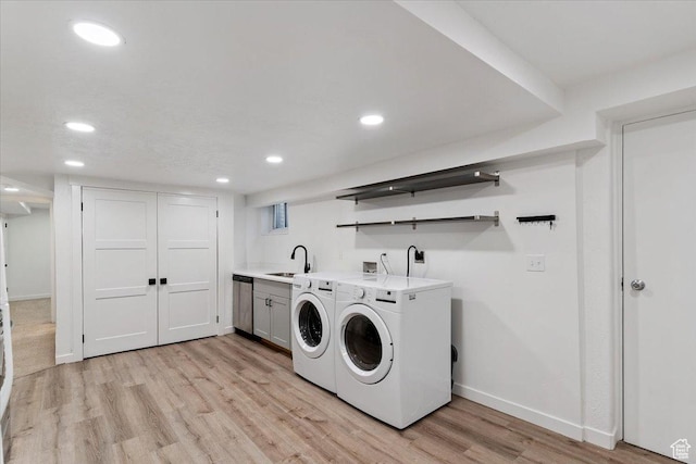 321 E 1040 N, Orem, UT 84057 - washroom featuring cabinet space, light wood-type flooring, washing machine and clothes dryer, and recessed lighting