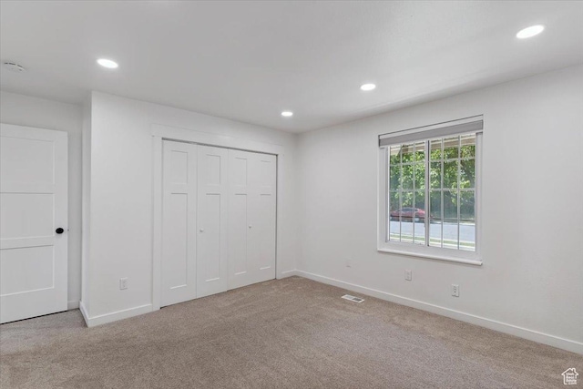 321 E 1040 N, Orem, UT 84057 - unfurnished bedroom featuring carpet, recessed lighting, and a closet