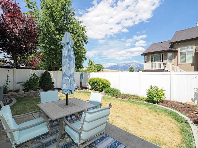 11965 S Draperville Ave, Draper, UT 84020 - fenced backyard featuring outdoor dining space