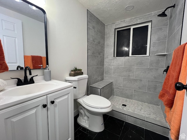 6770 W 3860 S, West Valley City, UT 84128 - full bathroom with a tile shower, a textured ceiling, and vanity