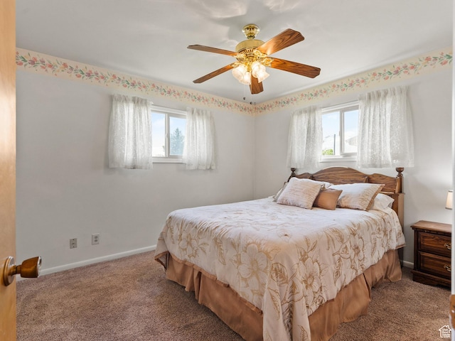 320 S 2nd St W, Soda Springs, ID 83276 - carpeted bedroom with multiple windows and ceiling fan