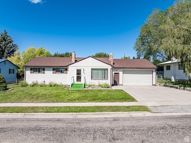 320 S 2nd St W, Soda Springs, ID 83276 - ranch-style home with concrete driveway, a garage, a chimney, and a front lawn