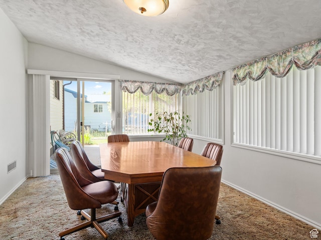 320 S 2nd St W, Soda Springs, ID 83276 - dining space featuring lofted ceiling, a textured ceiling, and carpet floors