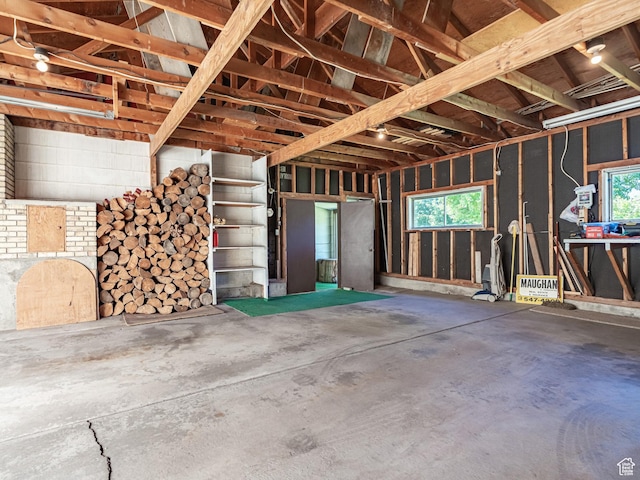 320 S 2nd St W, Soda Springs, ID 83276 - misc room featuring unfinished concrete floors and a garage