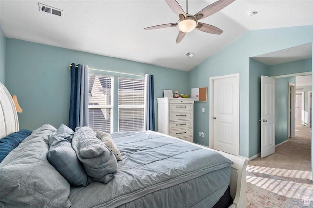 5023 W Currant Dr S, South Jordan, UT 84009 - bedroom with multiple windows, light carpet, vaulted ceiling, and ceiling fan