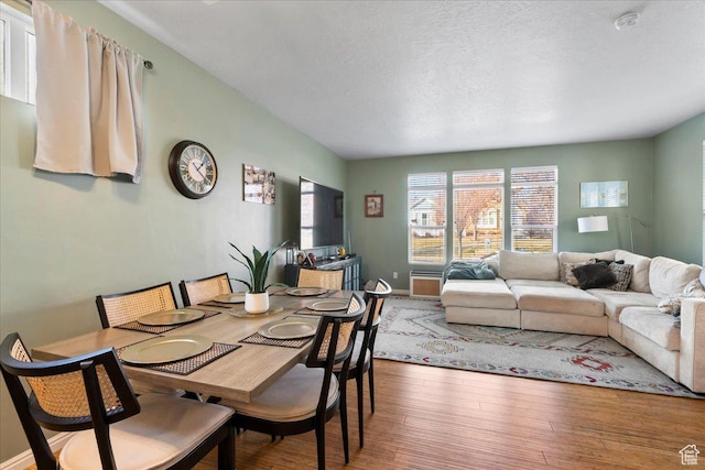 5023 W Currant Dr S, South Jordan, UT 84009 - dining area with wood finished floors and a textured ceiling