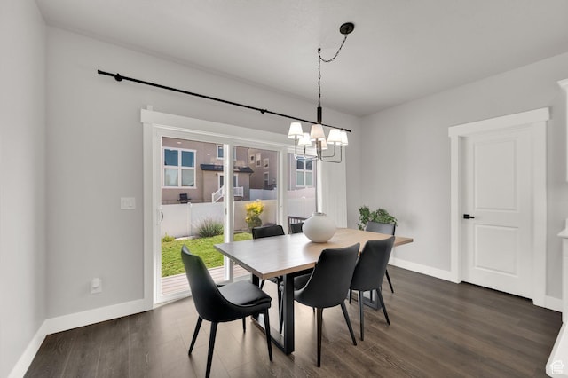 6729 W Dry Peak Dr, Herriman, UT 84096 - dining space with a chandelier and dark wood-type flooring