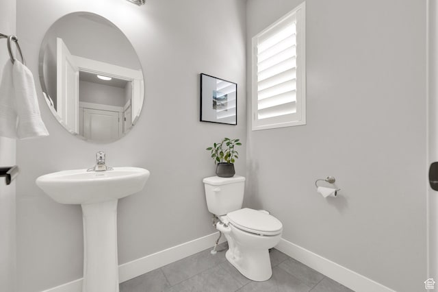 6729 W Dry Peak Dr, Herriman, UT 84096 - half bath with toilet and tile patterned flooring