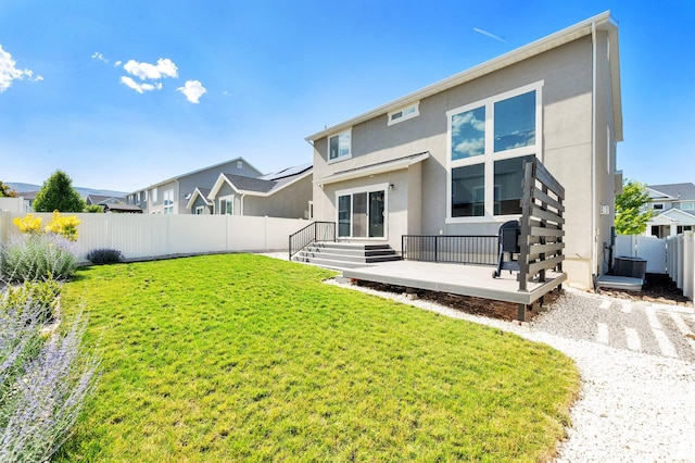 6729 W Dry Peak Dr, Herriman, UT 84096 - rear view of house with stucco siding and a fenced backyard