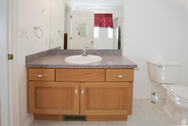 2187 N 3900 W, Plain City, UT 84404 - bathroom featuring vanity, tile patterned floors, and a shower with shower door