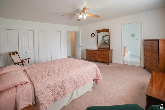 2187 N 3900 W, Plain City, UT 84404 - bedroom with multiple closets, light carpet, ensuite bath, and ceiling fan