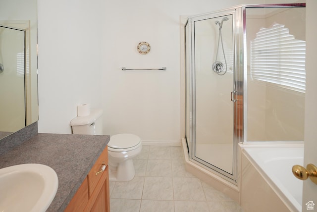 2187 N 3900 W, Plain City, UT 84404 - full bathroom featuring vanity, a shower stall, tile patterned floors, and a garden tub