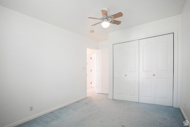 2187 N 3900 W, Plain City, UT 84404 - unfurnished bedroom with carpet, a closet, and a ceiling fan