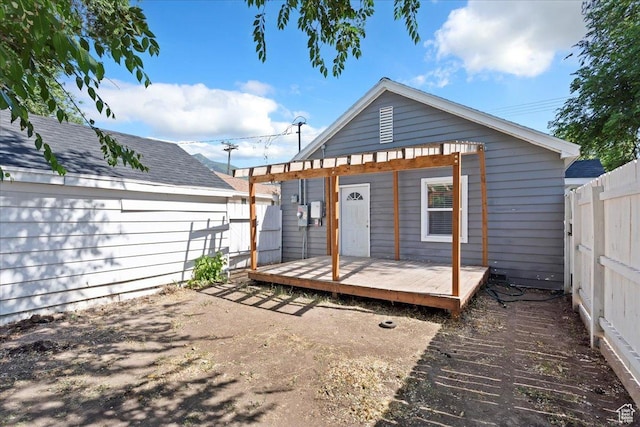 2692 S Monroe Blvd E, Ogden, UT 84401 - rear view of property with a wooden deck and a fenced backyard