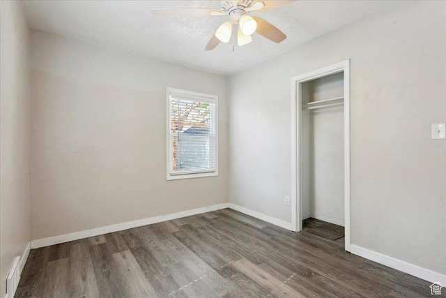 2692 S Monroe Blvd E, Ogden, UT 84401 - unfurnished bedroom with wood finished floors, a closet, and a ceiling fan
