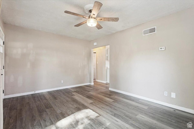 2692 S Monroe Blvd E, Ogden, UT 84401 - empty room with ceiling fan, wood finished floors, and a textured ceiling