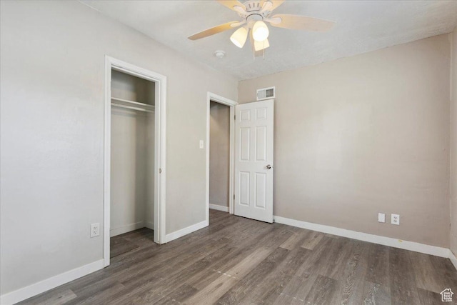 2692 S Monroe Blvd E, Ogden, UT 84401 - unfurnished bedroom featuring wood finished floors, a closet, and a ceiling fan