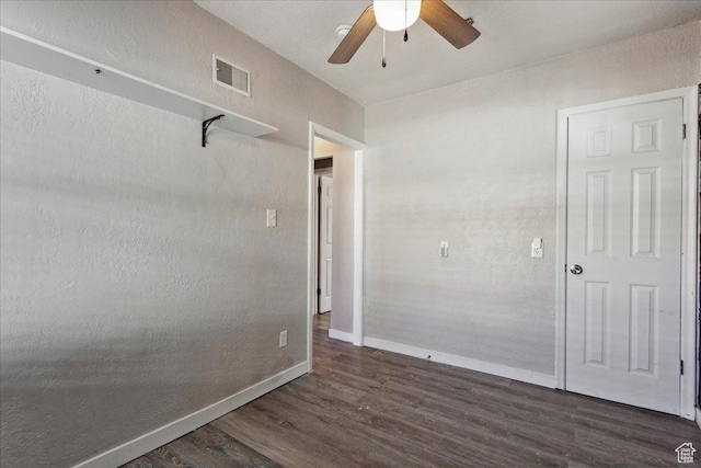 2692 S Monroe Blvd E, Ogden, UT 84401 - unfurnished room featuring dark wood-type flooring and a ceiling fan